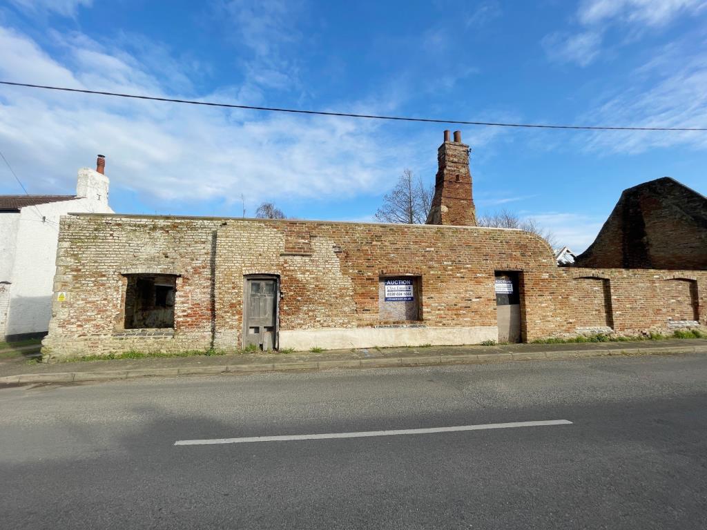 Lot: 58 - COTTAGE RENOVATION PROJECT WITH PLANNING IN VILLAGE LOCATION - Road frontage of the cottage renovation project